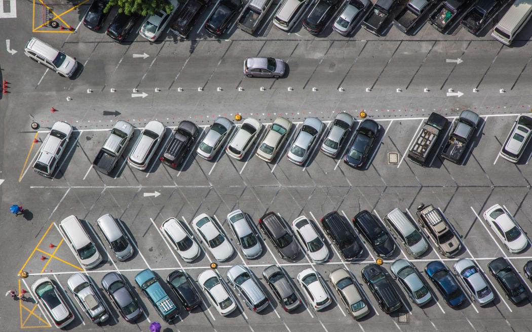 Car parking lot viewed from above, bird eye view
