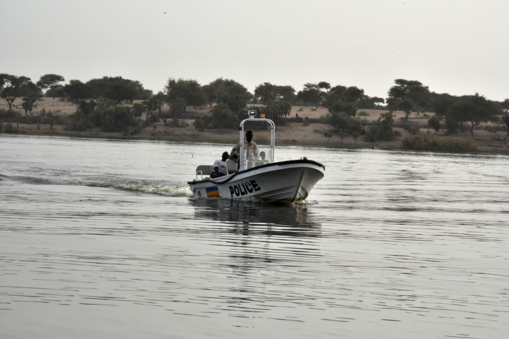 A boat of the Chadian police sails on Lake Chad which borders Chad, Nigeria, Niger and Cameroon.