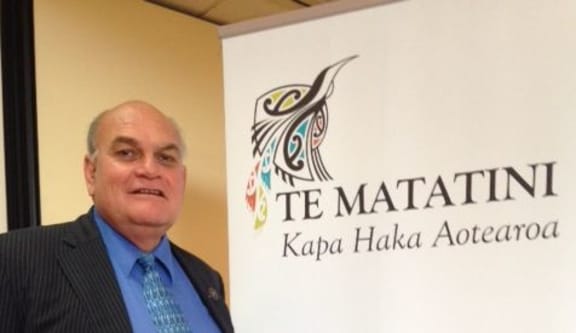 Te Matatini chairman, Selwyn Parata, next to the organisation's new brand.