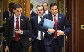 This handout photograph released in Jeddah by the official Telegram channel of Ukraine's Head of the Office of the President Andriy Yermak on March 11, 2025, shows US Secretary of State Marco Rubio (R) walking during the Ukrainian and US delegations meeting in Jeddah. In the Saudi-hosted talks, Ukraine is to present the US with a plan for a partial ceasefire with Russia, hoping to restore support from its key benefactor, which under President Donald Trump has demanded concessions to end the three-year war. (Photo by Handout / Telegram /@ermaka2022 / AFP) / XGTY / RESTRICTED TO EDITORIAL USE - MANDATORY CREDIT "AFP PHOTO / OFFICIAL TELEGRAM CHANNEL OF THE HEAD OF THE OFFICE OF THE PRESIDENT OF UKRAINE ANDRIY YERMAK " - NO MARKETING NO ADVERTISING CAMPAIGNS - DISTRIBUTED AS A SERVICE TO CLIENTS