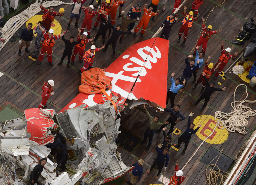 The tail of the AirAsia QZ8501 on the deck of the Indonesian Search and Rescue ship Crest Onyx after it was recovered.