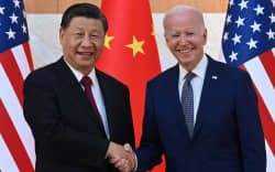 US President Joe Biden and China’s President Xi Jinping shake hands as they meet on the sidelines of the G20 Summit in Nusa Dua on the Indonesian resort island of Bali on 14 November, 2022.