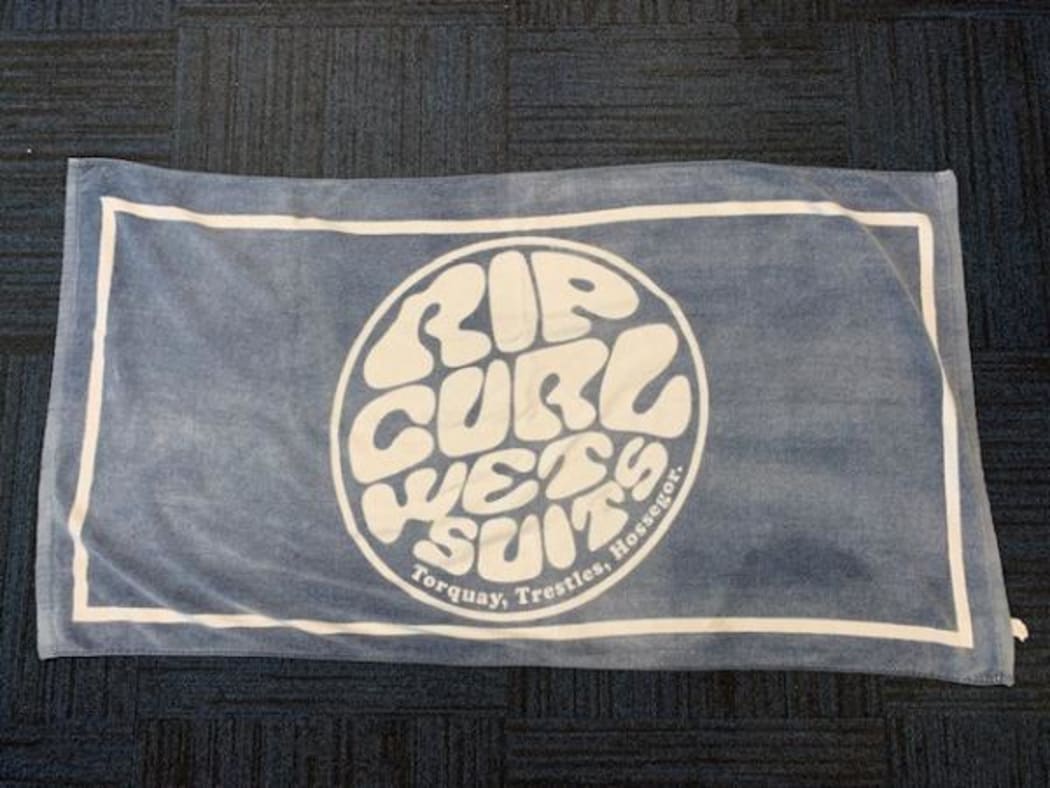 Police believe the towel pictured belongs to a young man who was found unresponsive in the water at Omanu Beach in Mount Maunganui on 8 Jaunary, 2022.
