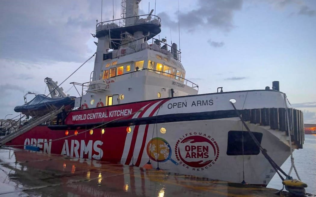 This handout picture released by the Spanish humanitarian NGO Proactiva Open Arms on March 9, 2024 shows the vessel, also called Open Arms, docked in the Cypriot port of Larnaca. A spokeswoman for Open Arms, a charity whose boat docked three weeks ago in the Cypriot port of Larnaca, said "everything will be ready to be able to set sail" later on March 9. The Spanish aid group has partnered with US charity World Central Kitchen to prepare the first aid delivery via the sea route that the EU Commission hopes will open this weekend. (Photo by PROACTIVA OPEN ARMS / AFP)