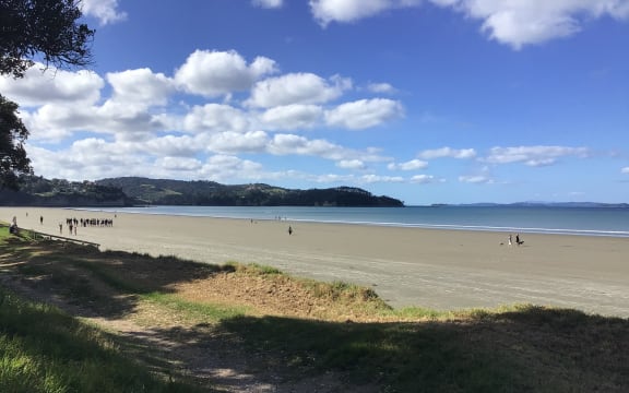 Audrey listens to RNZ Concert from Orewa Beach