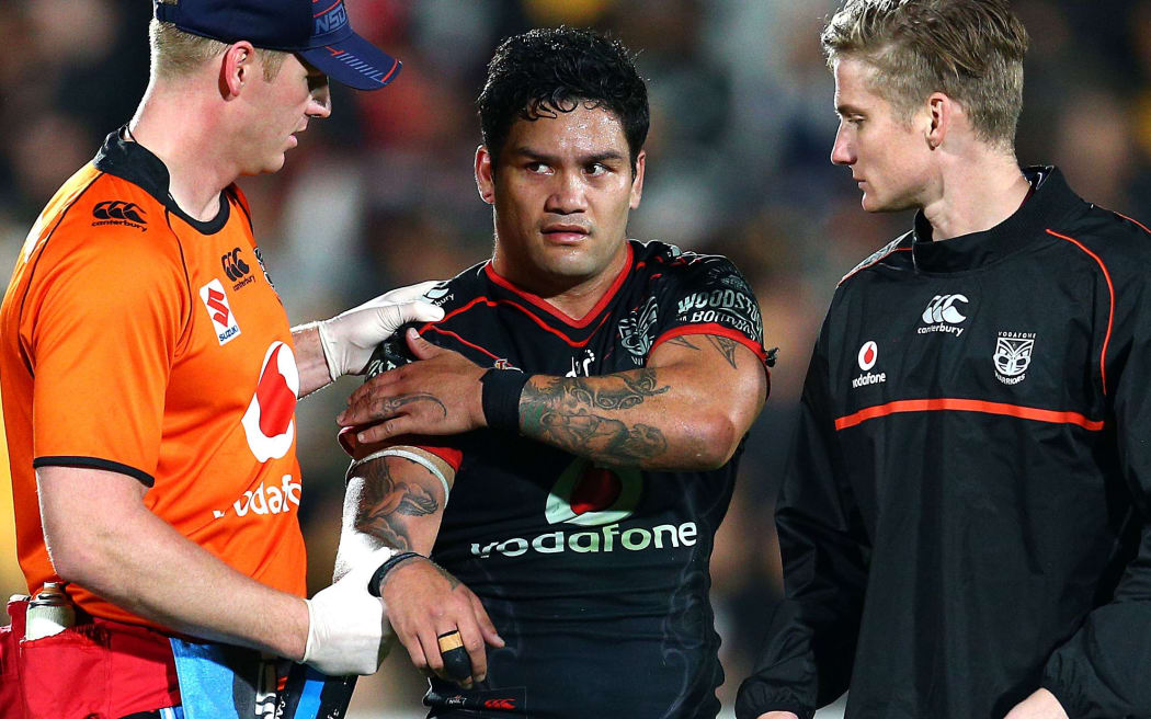 Warriors hooker Issac Luke is treated for an injured shoulder.