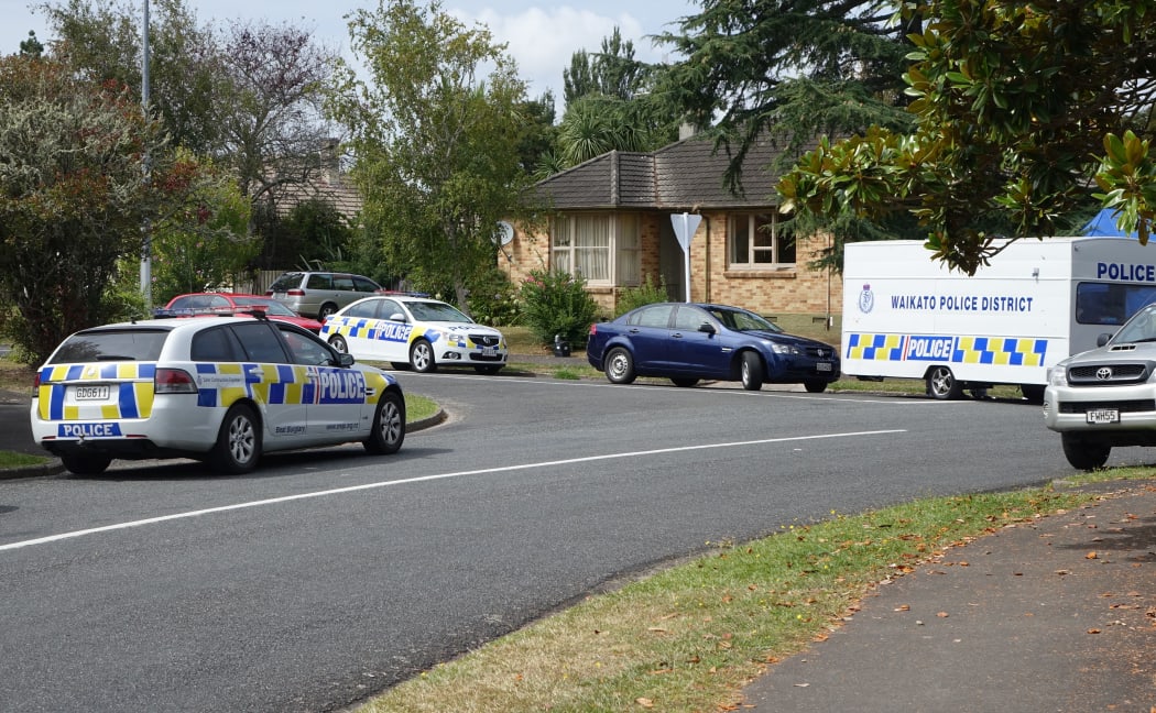 Police at the Melville property.