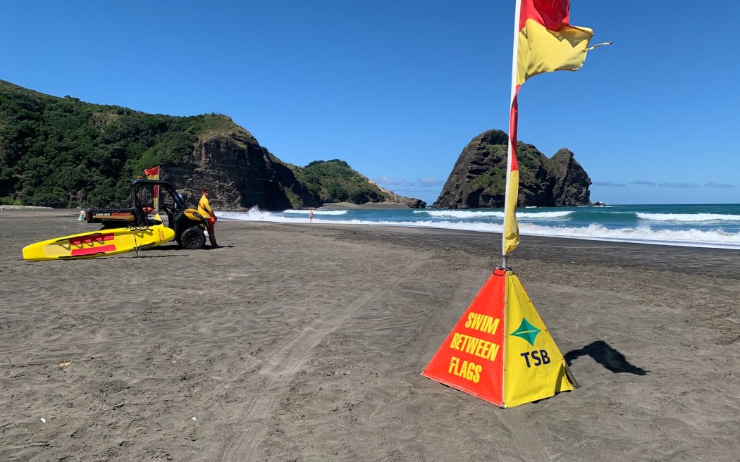 Surf lifesavers at Piha Beach