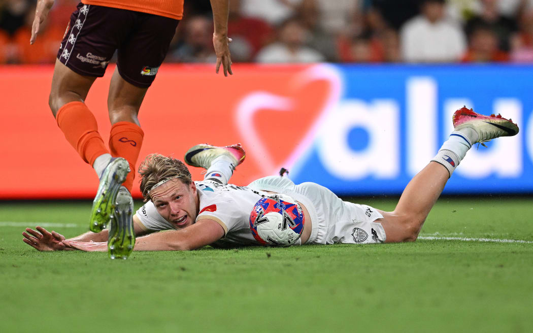Sam Cosgrove of Auckland FC after being fouled during the A-League Men’s Round 12 match against Brisbane Roar Brisbane, January 9, 2026. (AAP Image/Dave Hunt/Photosport)