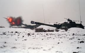 Russian artillery fires shells aimed at the south of Grozny on 24 January as Russian forces continued their military offensive against rebel positions arond the capital of the breakaway Chechen republic.