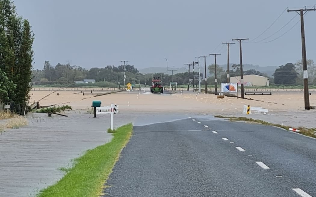 The road from Baylys Beach to Dargaville in Northland flooded yesterday.