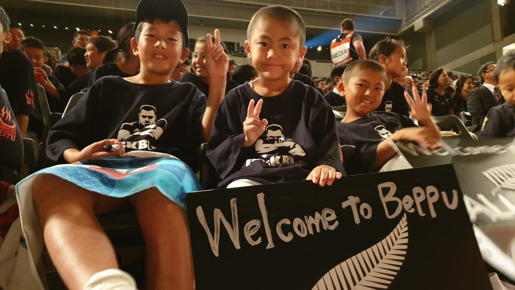 Fans watch Rotorua kapa haka performers and Kiwi band SIX60.