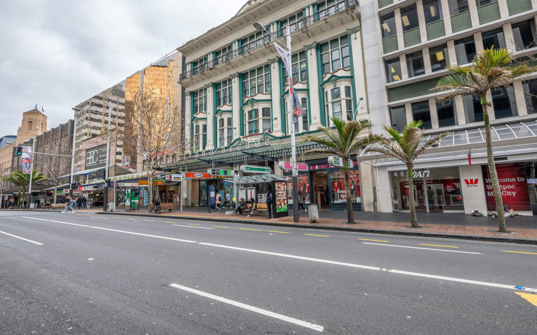 AUCKLAND, NEW ZEALAND - AUGUST 26, 2018: Queen Street buildings on a sunny winter day. The city attracts 2 million tourists annually.