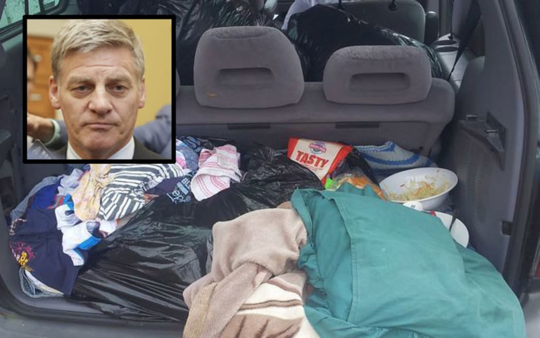 Bill English, boot of car being lived in.