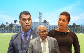 Fiji's now dismissed education minister Aseri Radrodro, left, and women's and children's minister Lynda Tabuya, right. Prime Minister Sitiveni Rabuka, middle, has said he will not respond to "comments on social media".
