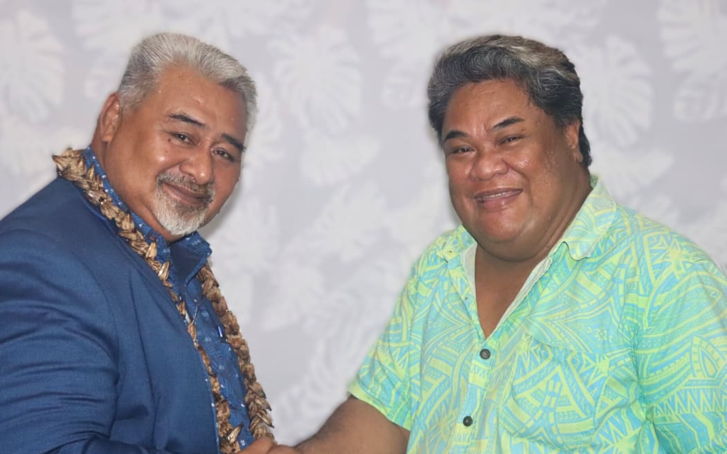 Elections Commissioner Toleafoa Tuiafelolo Alex Stanley and Vaimauga 3 Candidate Siligatusa Alosina Ropati during registration week for aspiring MPs. Photo/Office of the Electoral Commissioner