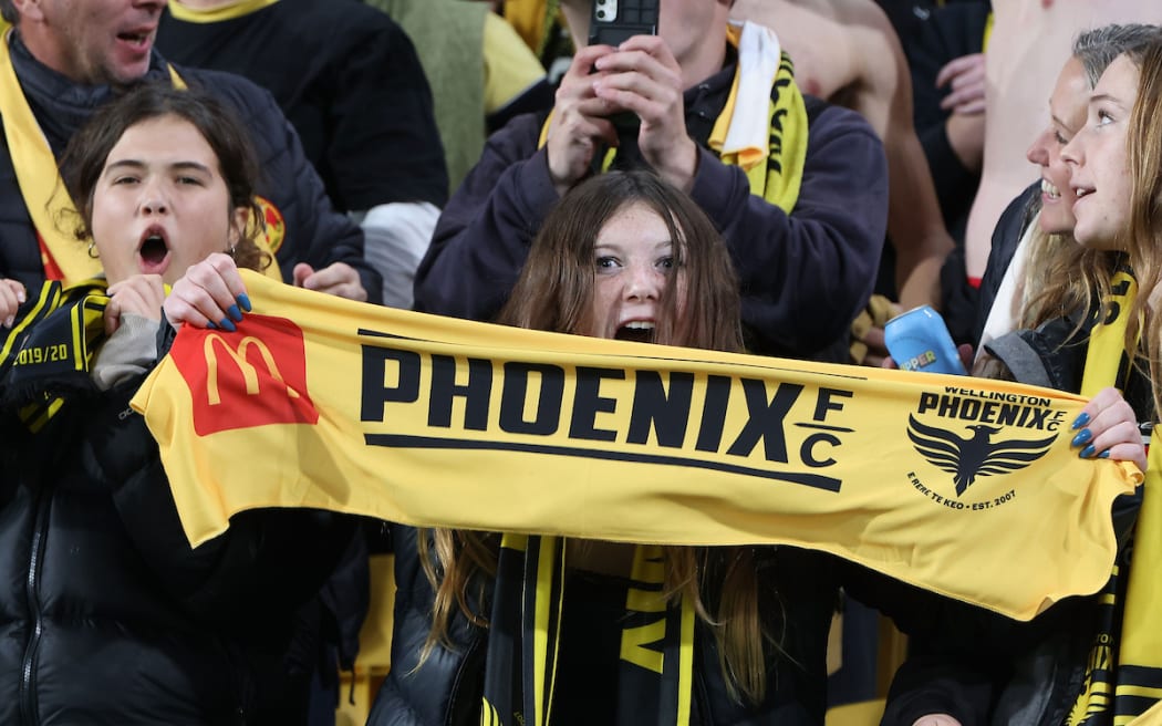 Fans celebrate a goal during the A-League Men’s Semi Final 1 (2nd leg) - Wellington Phoenix v Melbourne  Victory FC at Sky Stadium, Wellington on the 18th May 2024. © Copyright image by Marty Melville / www.photosport.nz