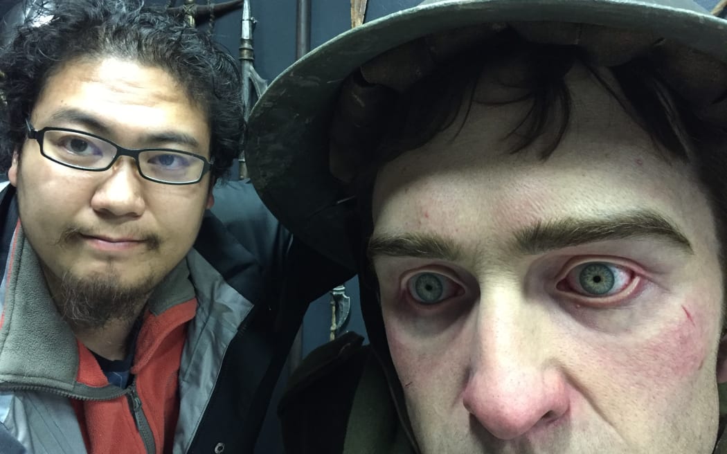 The last of the eight sculptures at the Gallipoli: The Scale of Our War exhibition showing serviceman Cecil Malthus in a muddy shell hole was handcrafted by Sam Gao.