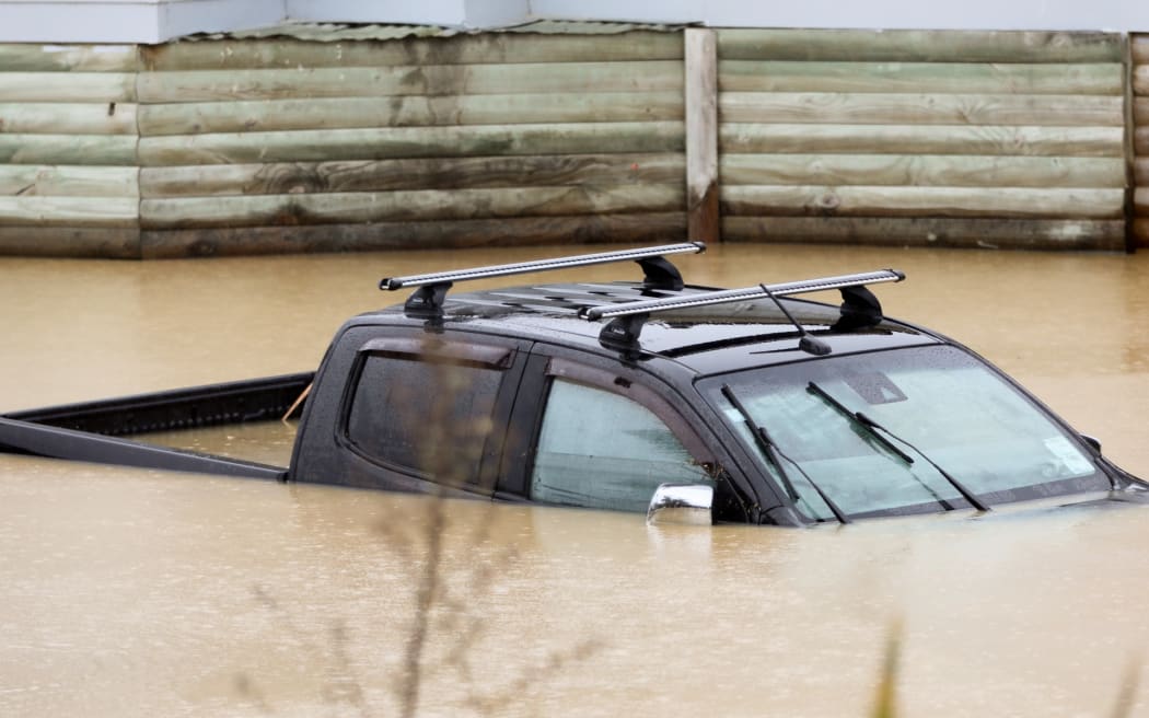 A ute is submerged at Robert Prescott's home on Phillips Road in Ōtorohanga - 14 February 2026