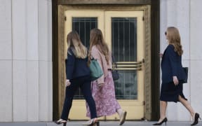 LOS ANGELES, CALIFORNIA - FEBRUARY 26: Plaintiff "K.G.M." (C) arrives at Los Angeles Superior Court at United States Court House on February 26, 2026 in Los Angeles, California. Plaintiff “K.G.M.” is scheduled to testify today in a landmark case accusing Meta and YouTube of building addictive social media platforms causing harm to children.   Mario Tama/Getty Images/AFP (Photo by MARIO TAMA / GETTY IMAGES NORTH AMERICA / Getty Images via AFP)