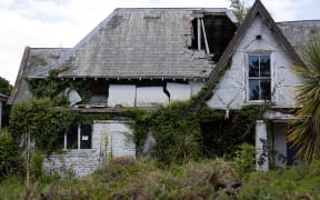An old abandoned building on Fitzerald Avenue on the edge of Christchurch, on February 17, 2021, nearly 10 years after it was damaged in a 6.3 magnitude earthquake.