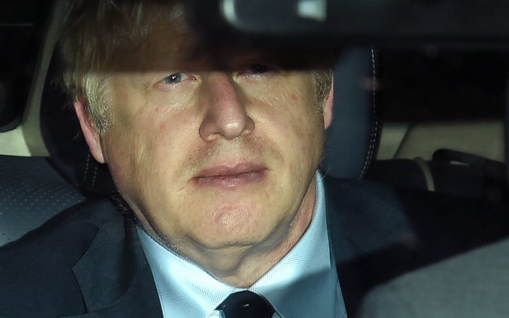 Britain's Prime Minister Boris Johnson is driven away from the Houses of Parliament after suffering a major parliamentary defeat in an emergency debate over his Brexit strategy on Tuesday.