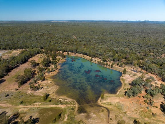 Drone aerial view looking down over sapphire mine diggings in central Queensland Australia.