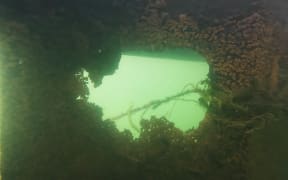 The Ōhau channel diversion wall was built in 2008 to divert polluted nutrient-rich water from Lake Rotorua, which otherwise flowed into Lake Rotoiti through a small channel, but critics say holes from corrosion allows water through.