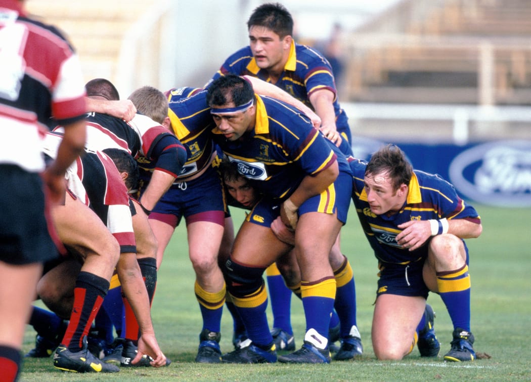 Highlanders prop Michael Mika prepares to pack down during the Super 12 match between the Otago Highlanders and Queensland Reds in 1996.