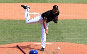 Josh Collmenter pitching for the Arizona Diamondbacks in Major League Baseball.