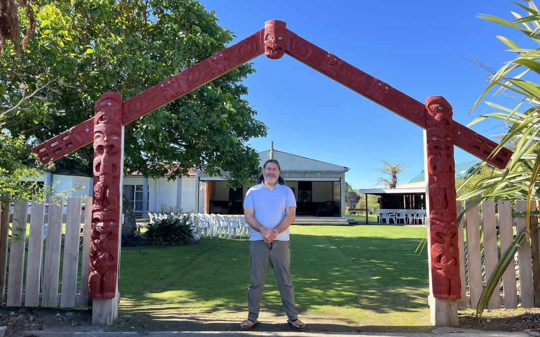 Geoffrey Hipango at the waharoa of Te Ao Hou Marae