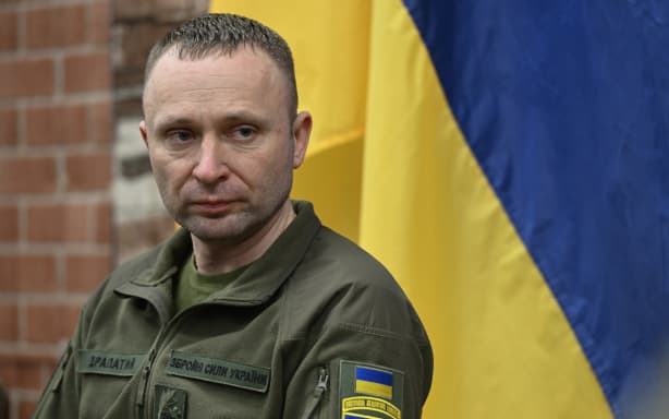 (FILES) Commander of Ukrainian land forces Mykhailo Drapaty speaks to journalists at an undisclosed location in the Donetsk region on January 6, 2025, amid the Russian invasion of Ukraine. Ukrainian President Volodymyr Zelensky said on July 21, 2026 that he was dismissing Oleksandr Syrsky, commander-in-chief of Ukraine’s army, and appointing joint forces commander Mykhailo Drapaty in his place. (Photo by Genya SAVILOV / AFP)
