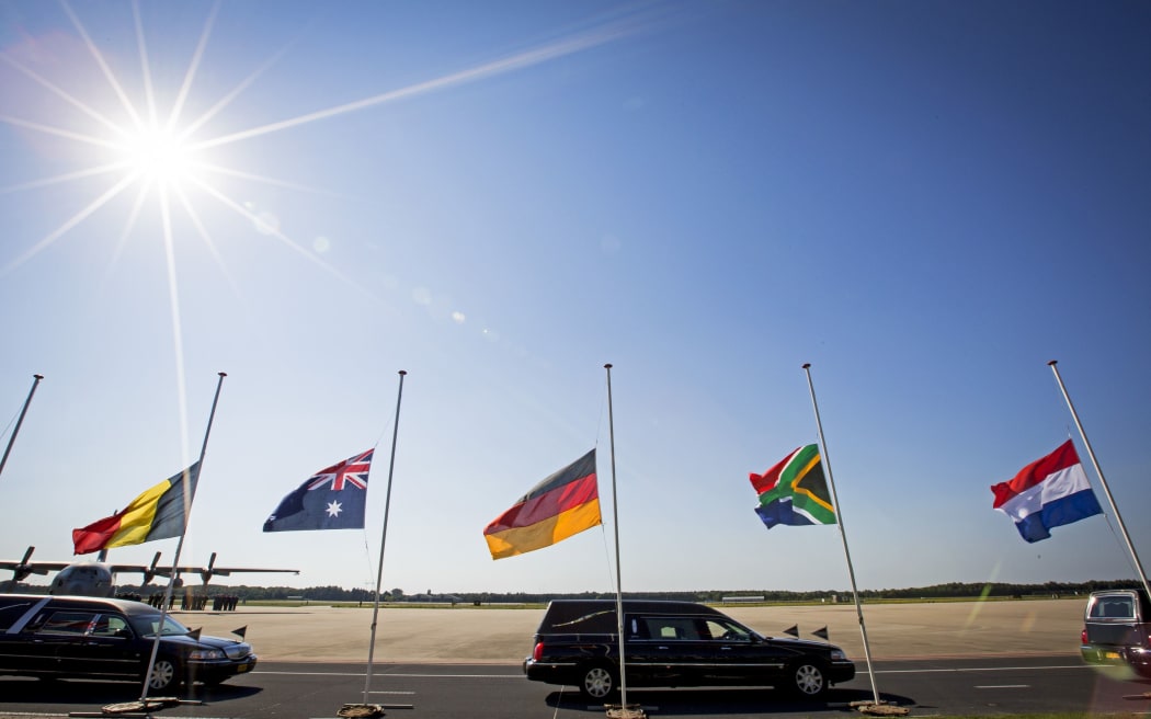 Hearses took the victims from the air base to a facility where the identification process will begin.