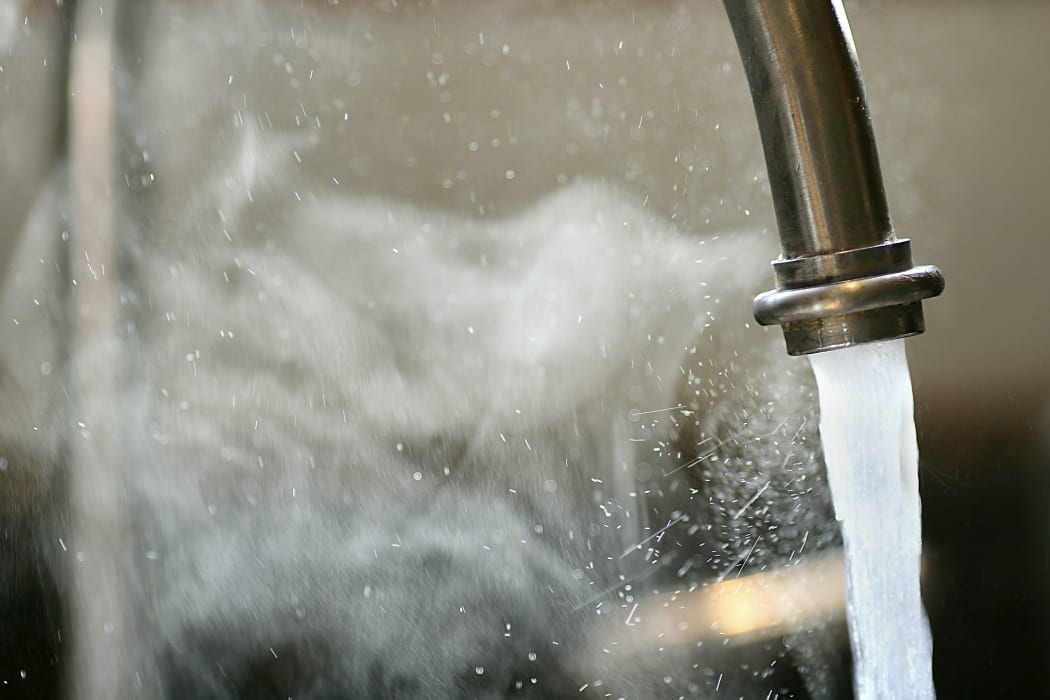 Water tap running.