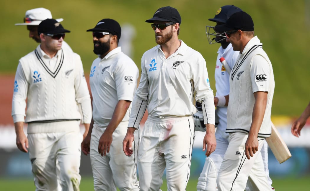 The Black Caps wander off the Basin Reserve after a long day in the field.