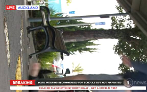 The camera operator was knocked over during a live cross.