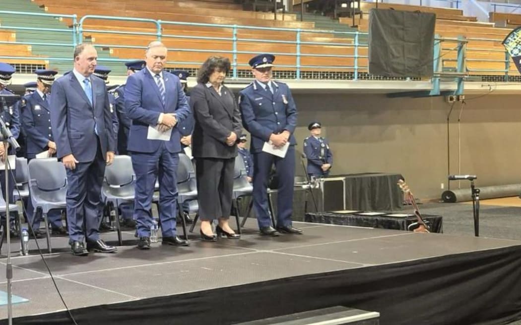 The graduation ceremony of a police recruit wing in Auckland on Friday morning. From L to R is Sir John Key, Police Minister Mark Mitchell, Deputy Police Minister Casey Costello, and Police Commissioner Richard Chambers.