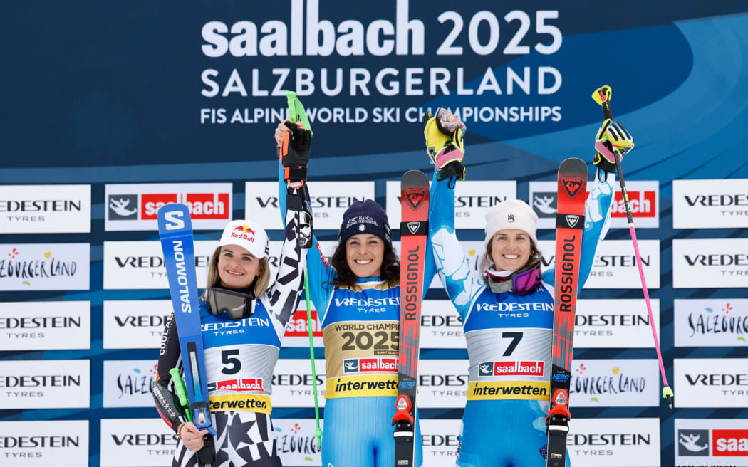 SAALBACH, AUSTRIA - FEBRUARY 13: Alice Robinson of Team New Zealand wins the silver medal, Federica Brignone of Team Italy wins the gold medal, Paula Moltzan of Team United States wins the bronze medal during the FIS Alpine World Ski Championships Women's Giant Slalom on February 13, 2025 in Saalbach, Austria. (Photo by Alexis Boichard/Agence Zoom)