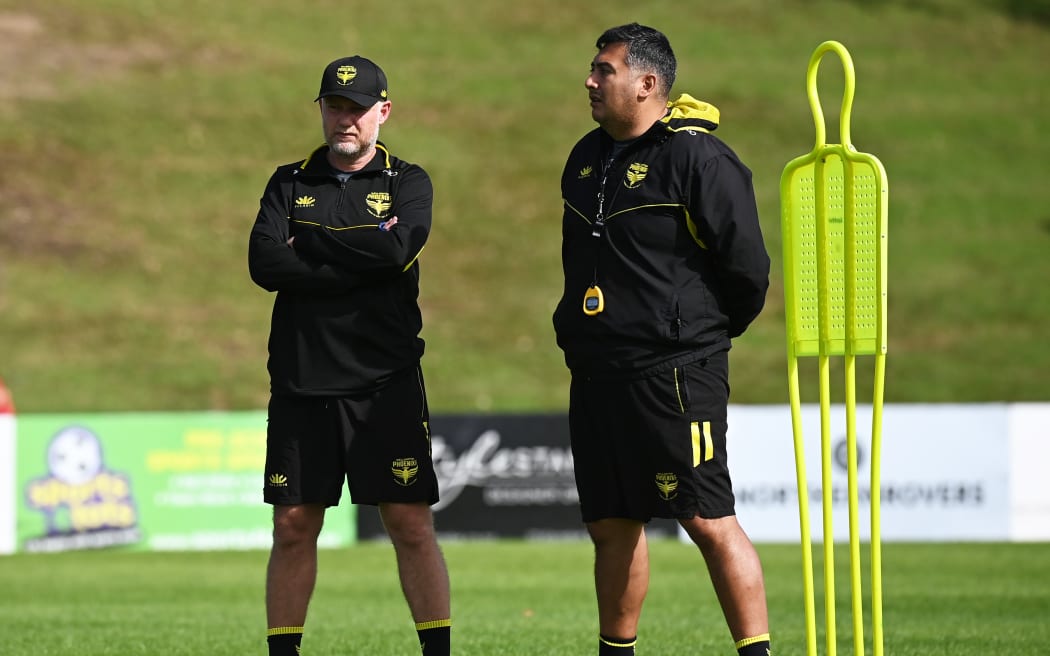Wellington Phoenix coach Ufuk Talay and assistant coach Giancarlo Italiano.