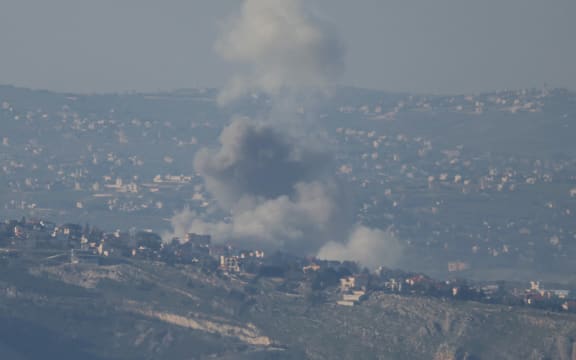 Smoke rises from the site of an Israeli airstrike in the southern Lebanese area of Deir Seryan on March 2, 2026. Israel bombarded Lebanon on March 2, expanding conflict across the region after the massive Israel-US attack on Iran that President Donald Trump launched to topple Tehran's ruling clerics. (Photo by Rabih DAHER / AFP)