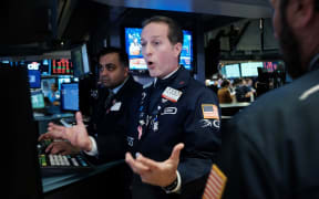 Traders work on the floor of the New York Stock Exchange (NYSE) on March 09, 2020 in New York City. As global fears from the coronavirus continue to escalate, trading was halted for 15 minutes after the opening bell as stocks fell 7 percent.