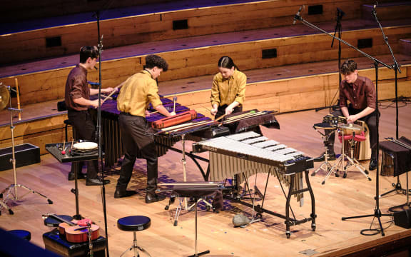The percussion ensemble WATPIC performing on stage at the Auckland Town Hall