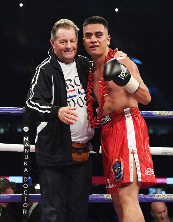 New Zealand's Mose Jr Auimatagi celebrates his win over Morgan Jones with trainer Grant Arkell.