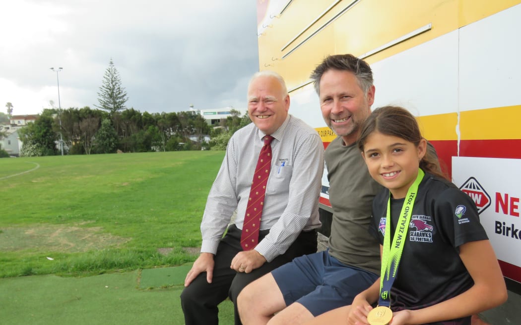 Lucia, David Hurst, and Northcote Birkenhead Rugby Union and Sports Club president Simon Williamson.