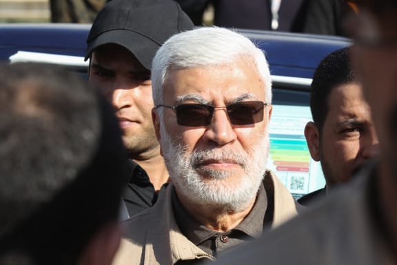 Abu Mahdi al-Muhandis, a commander in the Popular Mobilization Forces, attending the funeral procession of Hashed al-Shaabi fighters in Baghdad on 31 December, 2019.