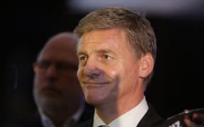 Bill English speaks at a press conference after meeting with Chinese Premier Li Keqiang.