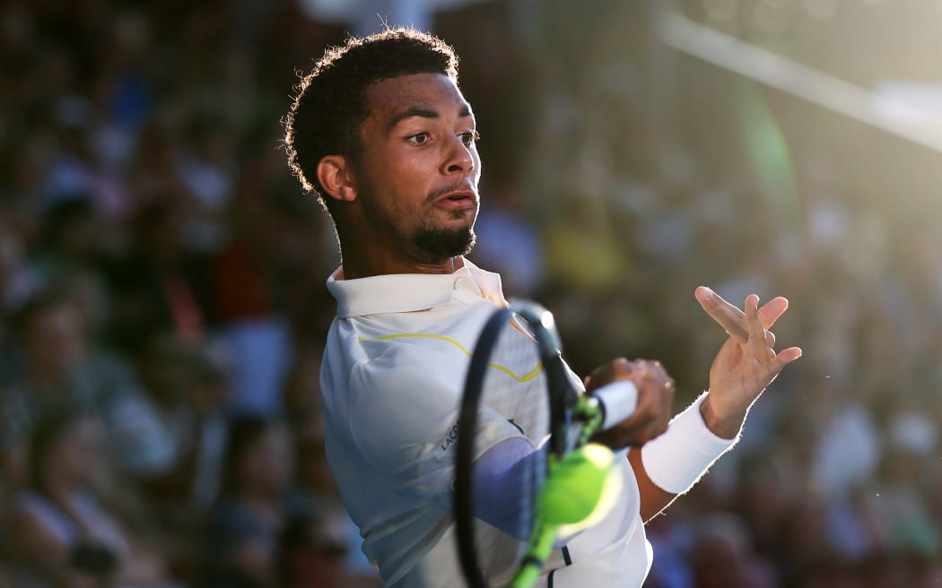 Arthur Fils of France plays a forehand in his match.