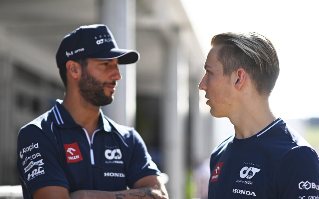 Daniel Ricciardo (L) and Liam Lawson.