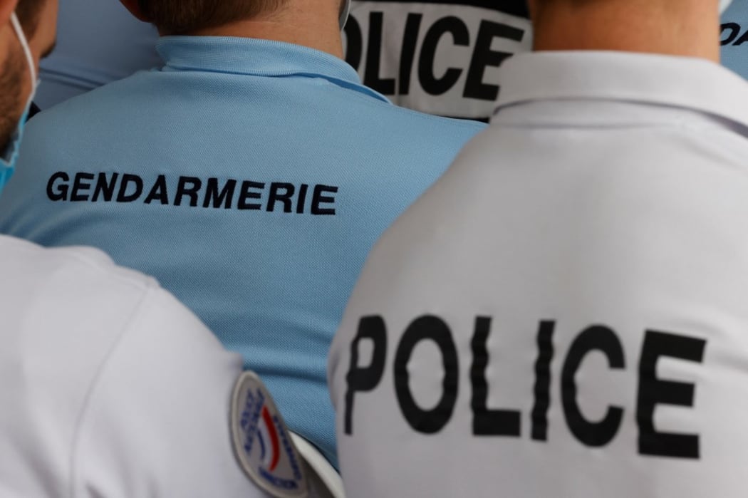 French gendarmes and police officers listen to the speech of French President at the police academy of Roubaix, northern France, on September 14, 2021. (Photo by Ludovic MARIN / various sources / AFP)