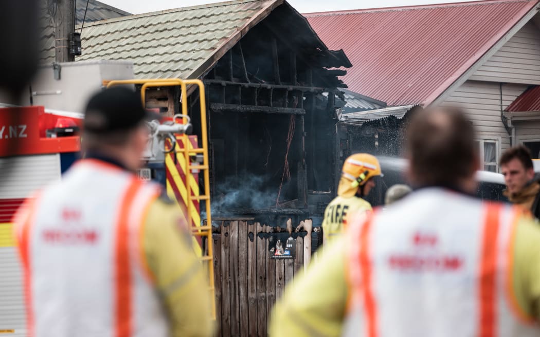 Firefighters at a blaze at a house in Yule Street, Wellington.